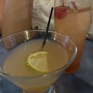 a glass of lemonade and a drink