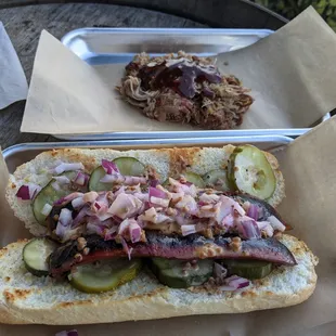 Pulled pork and waguy hot dog