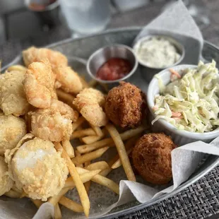 Lightly breaded shrimp and scallops. Amazing hush puppies.
