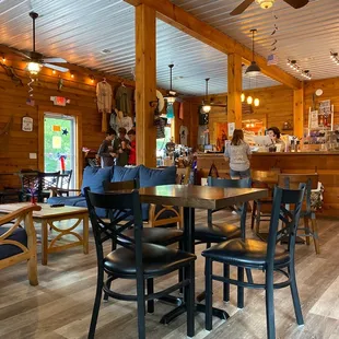a dining room with a ceiling fan