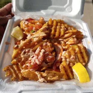 Lobster roll waffle fries with awesome sauce