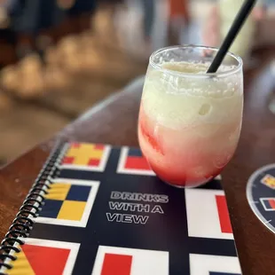 a drink with a straw on a table