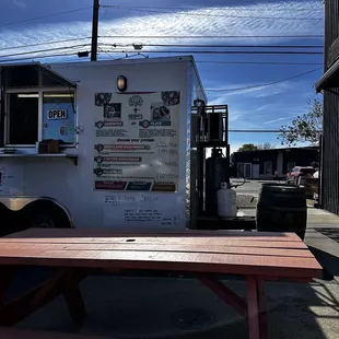 a food truck parked in a parking lot