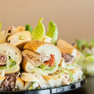 a platter of sandwiches