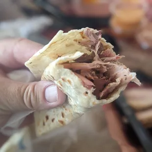 Smoked carnitas in a homemade tortilla with a secret ingredient.