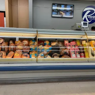 a display of various types of bread and pastries