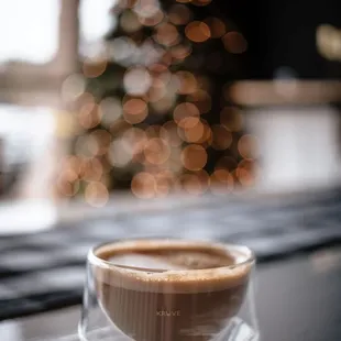 a cup of coffee on a table