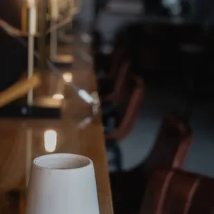 a coffee cup on a wooden table