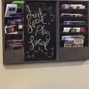 a blackboard with a chalkboard sign on it