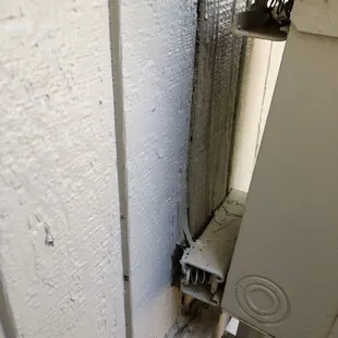 Hot tub electrical box coming off the wall...More  Rotten wood