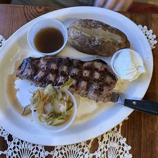 Strip Steak with potato. He also had a side salad that was consumed before I could take a picture. I guess he really liked it!