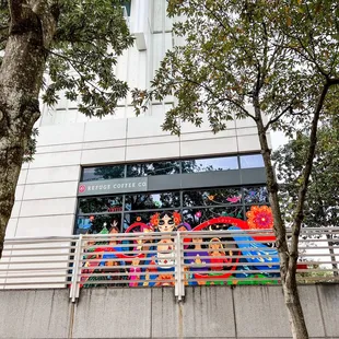 people on a balcony of a building