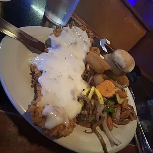 a serious piece of fried chicken, cream gravy is very good