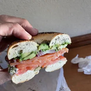 Lox and avocado on poppyseed bagel with green onion cream cheese. Awesome!