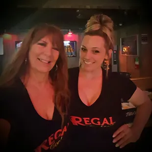 two women smiling for the camera