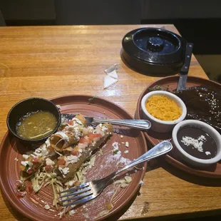 Taquitos and chicken mole