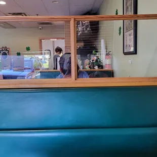 3 booths inside,  4 tables and about 6 seats at the counter