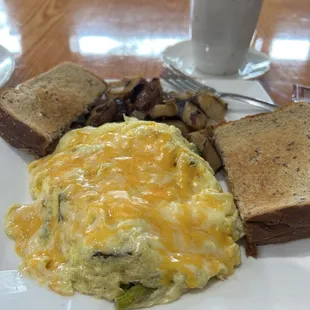 Asparagus and portobello mushroom omelet, home fries and rye toast
