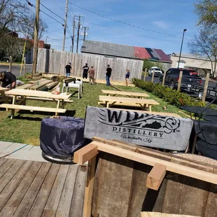 a picnic area with picnic tables and benches
