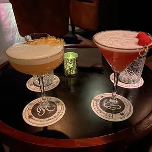 three cocktails on a table