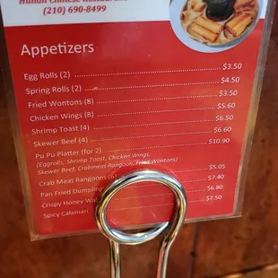 Appetizer menu on table.