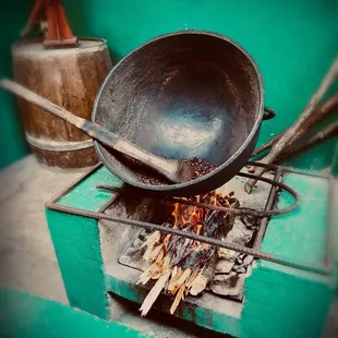 a frying pan over a fire