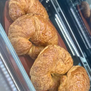 croissants in a display case