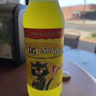 Pineapple drink, assuming it's from Jamaica. There is a wide variety of imported drinks.