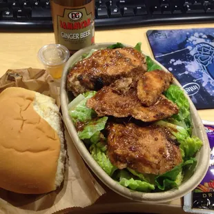 Coco bread; scotch bonnet sauce; Jamaican soda: ginger beer; jerk chicken salad.