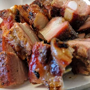 a plate of ribs and sides