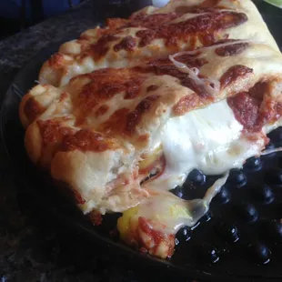 Pepperoni and banana pepper calzone