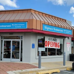 Regina's Restaurant in Wheaton with Grand Opening sign