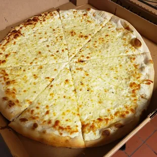 a cheese pizza in a box
