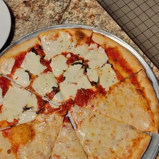 Cheese and Margherita Pizza  Sorry my man got excited before I could take a pic and took a slice. He tried to put it back together ‍