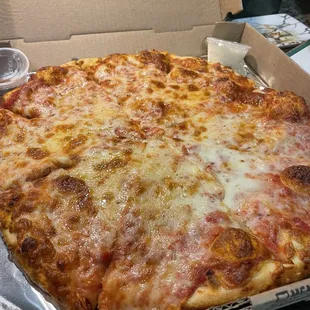 Medium pizza with extra cheese. No it&apos;s not a traditional NY style, but you won&apos;t care. The crust is flavorful and the sauce is amazing