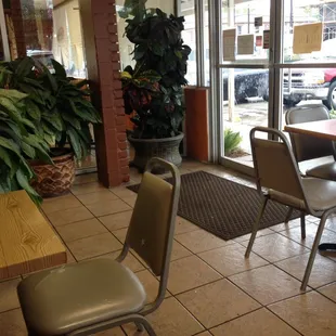 Quaint seating. Love that they have no booths.