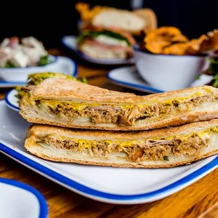 a plate of sandwiches on a table