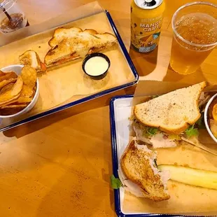 two plates of food on a wooden table