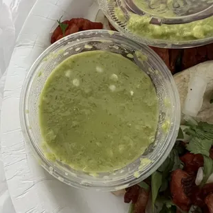 Their salsa verde packs heat and has a tang (lemon?)