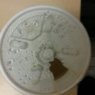 a plastic cup with a hole in it