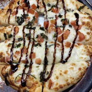 Bruschetta bread with balsamic drizzle. Made fresh in house