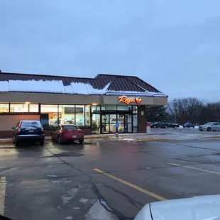 cars parked in front of the store
