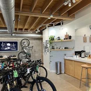 a coffee shop with bikes in the foreground