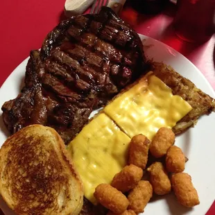 Ribeye, cheesy hasbrowns, cheeseballs, garlic toast....also had a salad and slaw!
