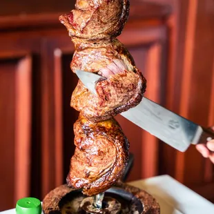 Picanha Skewer being carved table side