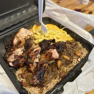 Jerk chicken, rice and peas and macaroni and cheese