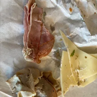 Ham on top, what's supposed to be turkey on the bottom, Swiss to the right. I had to pry the meat apart for the picture.