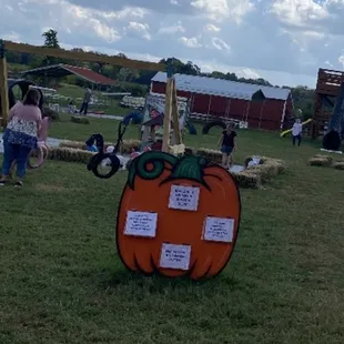 a sign with a pumpkin on it