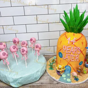 a pineapple and flamingos