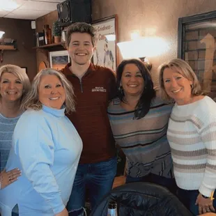 a group of people posing for a picture